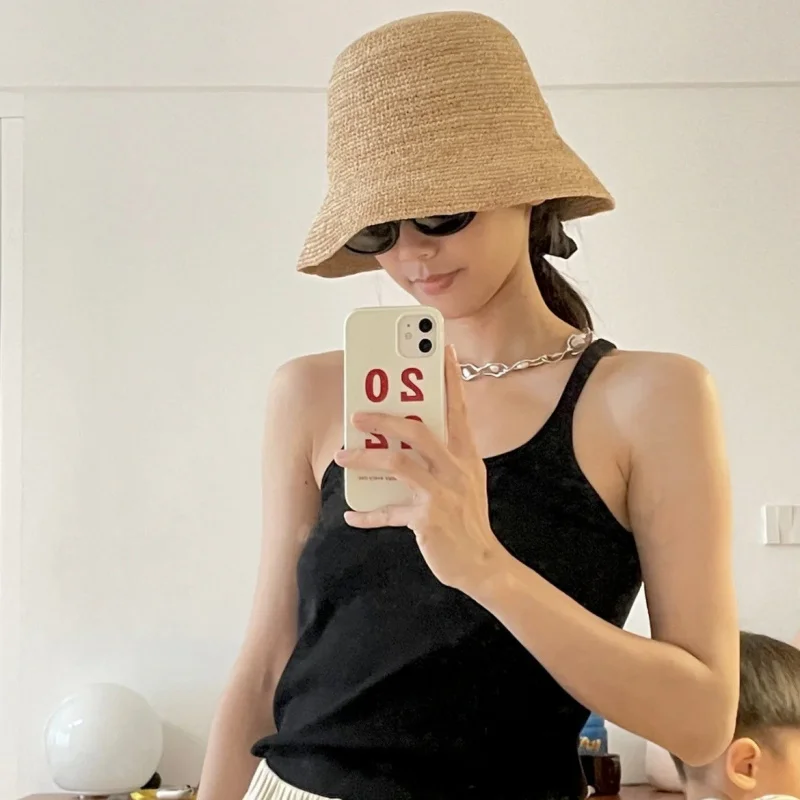 Korean-style summer versatile handmade crochet raffia fisherman round-top hat for woman Beach outdoor travel and sun protection