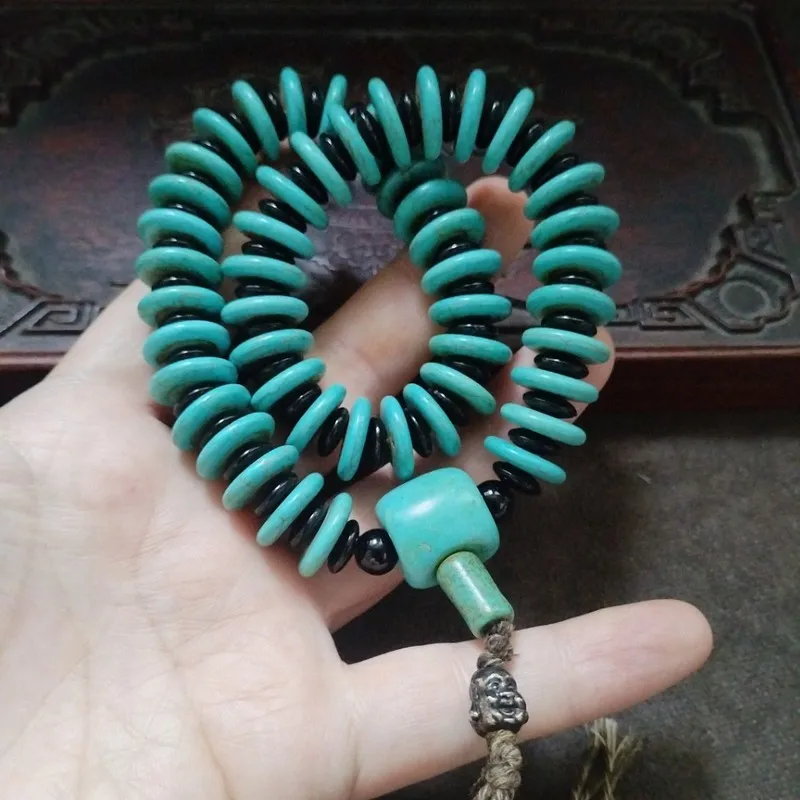 Antique collectible old patina round turquoise peace pendant bead handheld for display and enjoyment