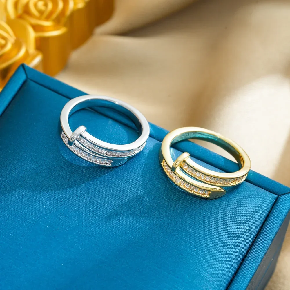 This is a latest unique, light luxury and niche design of a women's zircon ring with an open ring and a cool style.