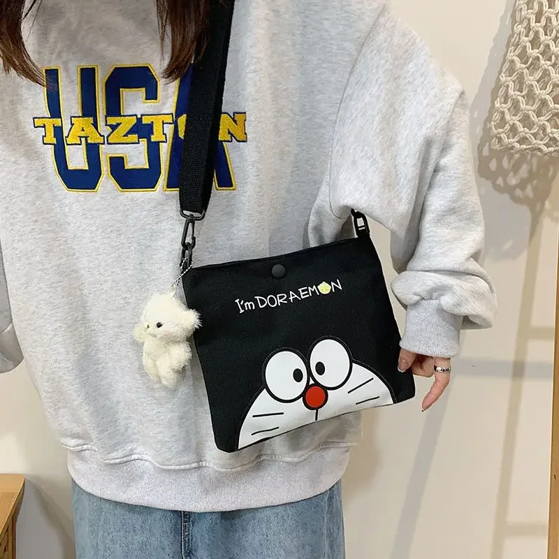 Popularne anime Doraemon płótno z nadrukiem kreskówkowym mała torba uroczy robot kot torba na ramię crossbody torba do przechowywania artykułów piśmienniczych prezent