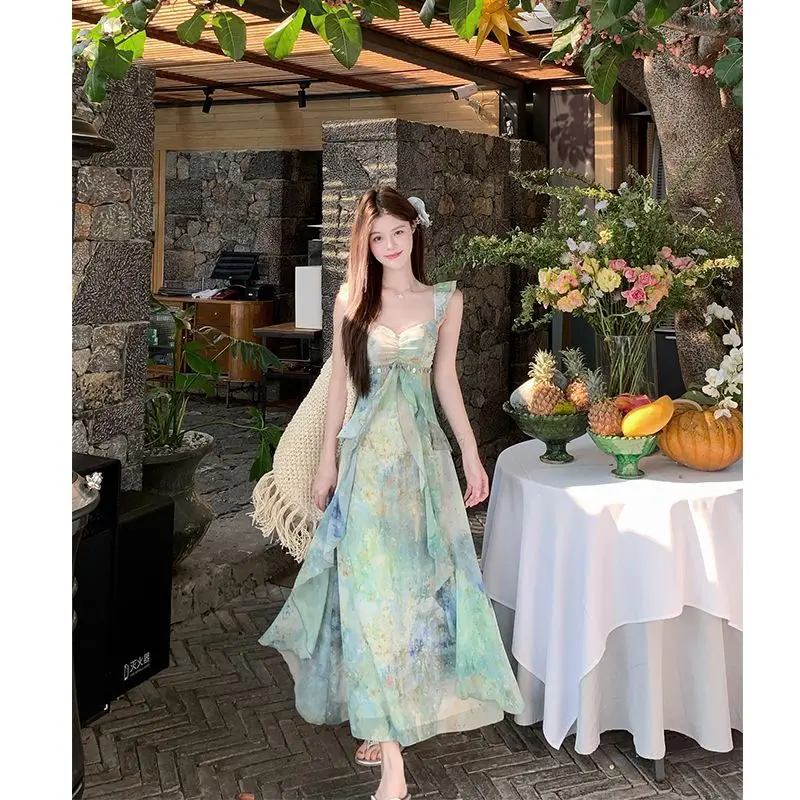 

Женское летнее модное макси-платье с цветочным принтом на тонких бретелях, стройнящее, для отпуска и пляжа