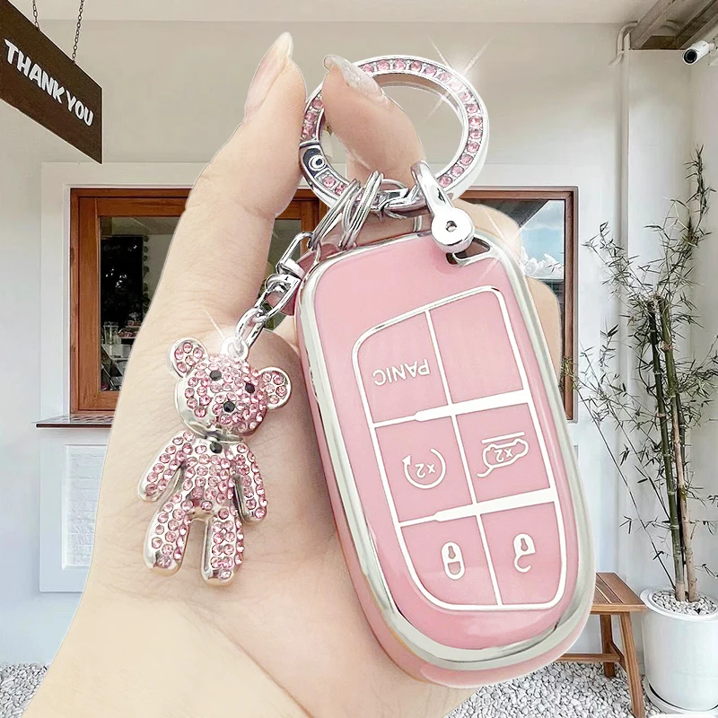 

Exquisite car keychain with high-end violent bear artificial diamond, keychain cover with soft TPU keycase, cherry blossom powde