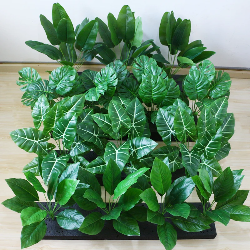 Artificial broad-leaved plant monstera plantain, tropical plantain, green tree green leaf bonsai