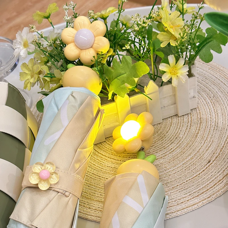 Luminous little yellow flower~ Umbrella Fully automatic weather and rain female niche parasol folding original student gift
