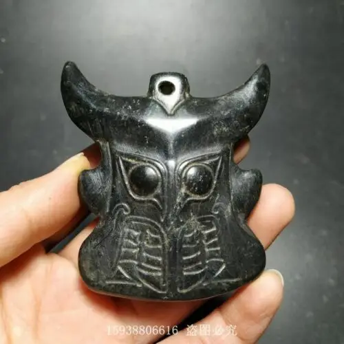 Colgante de la marca Tauren tallada en meteorito de la colección de cultura de montaña roja china