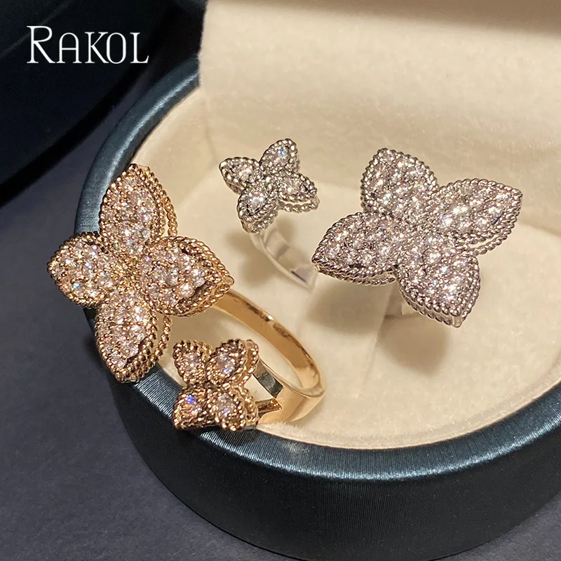 RAKOL White Cubic Zirconia Four Leaf Flower Open Adjustable Rings for Women  New Girls Party Jewelry Gifts Accessories