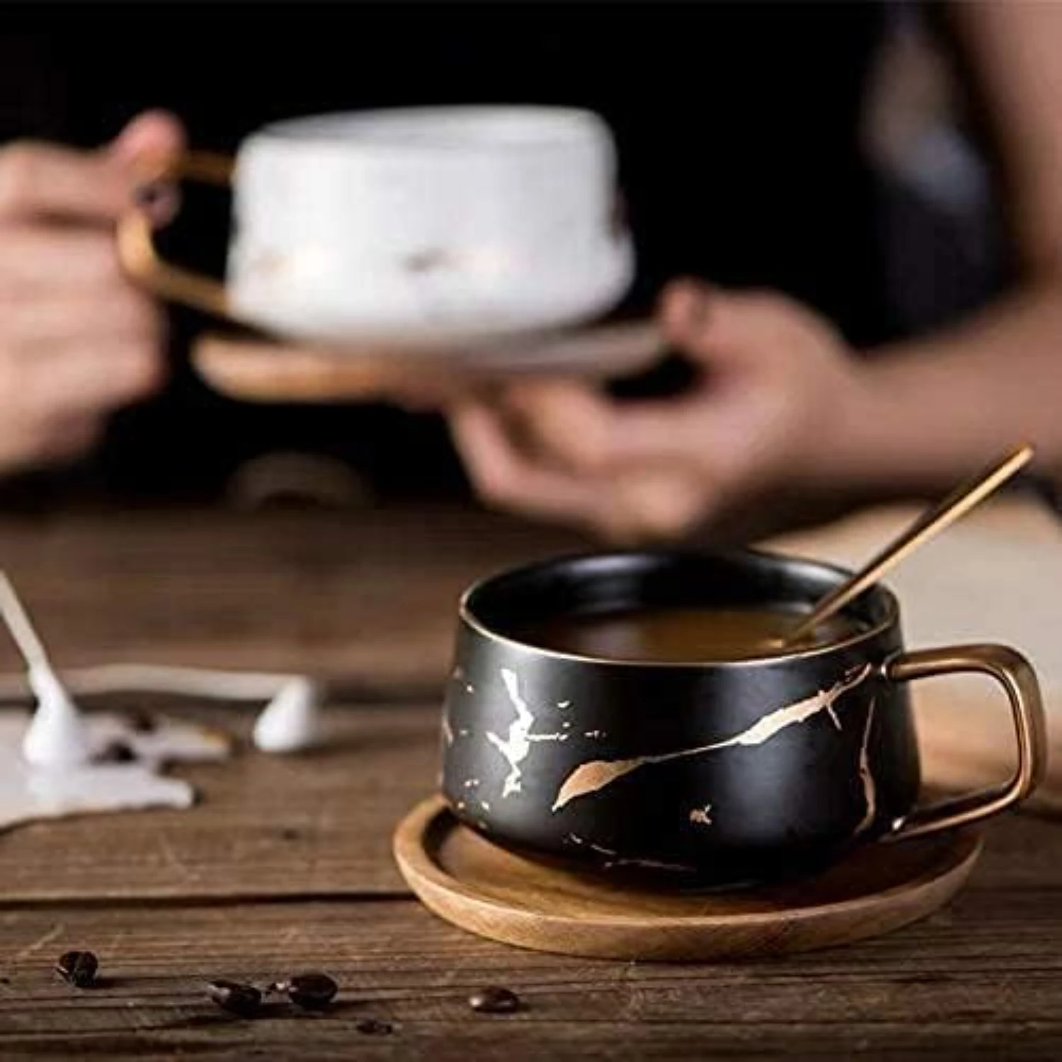 Luxurious and Elegant Matte Marble Ceramic Tea Coffee Cups with Stylish Black and White Luxury Wood Saucers, featuring Exquisite