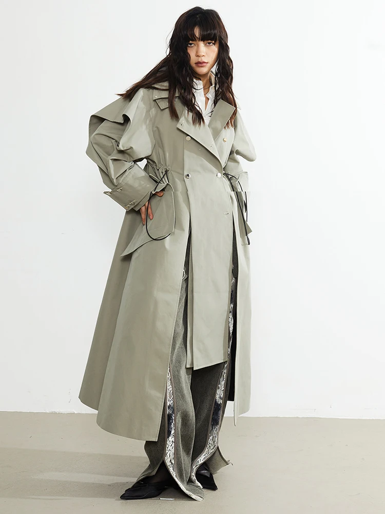 [EAM] Women Green Drawstring Irregular Big Size Long Trench New Lapel Long Sleeve Windbreaker Fashion Spring Autumn 2024 1DF3033