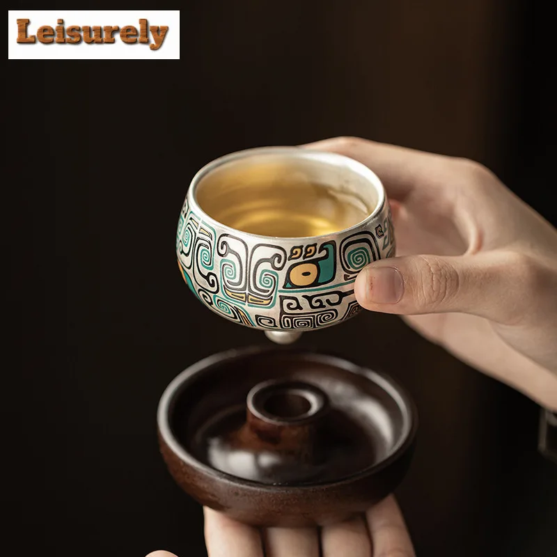

Gilt Silver Taotie Pattern Rotatable Tea Set Complete Set Luxury Tea Ceremony Set Teapot and Tea Cup Set Chinese Tea Set Craft