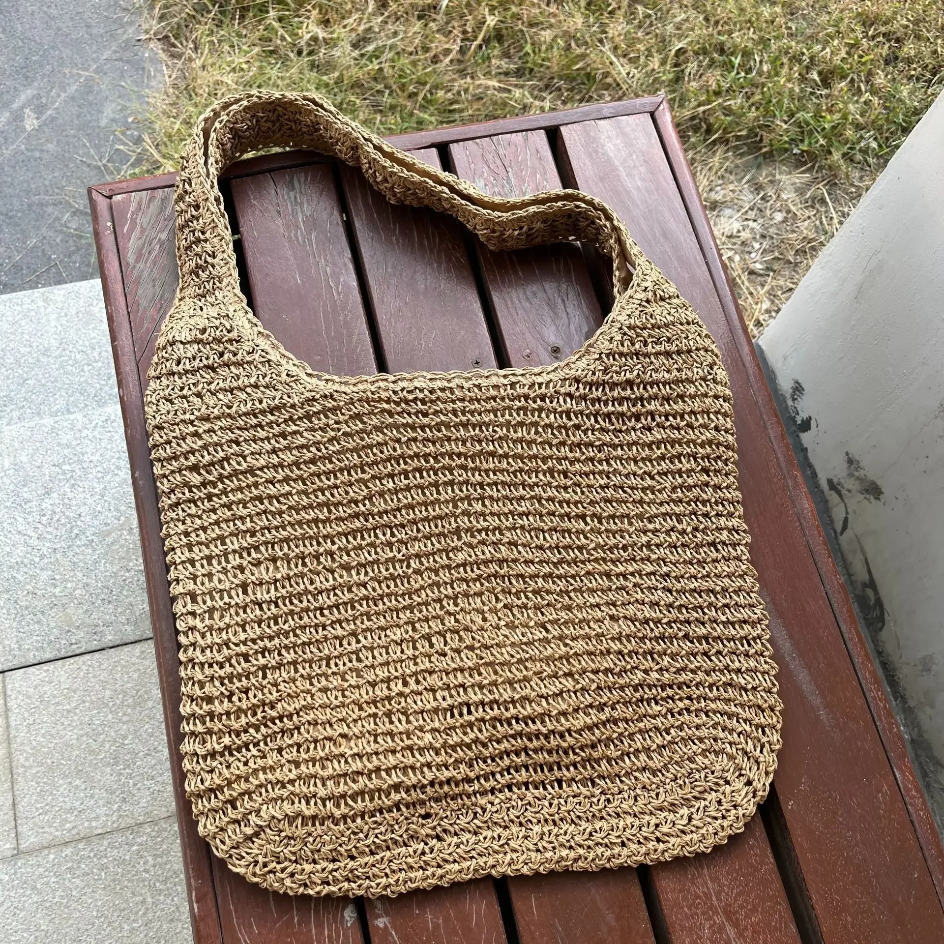 Solid color simple and fashionable paper rope woven beach single shoulder casual women's straw woven bag