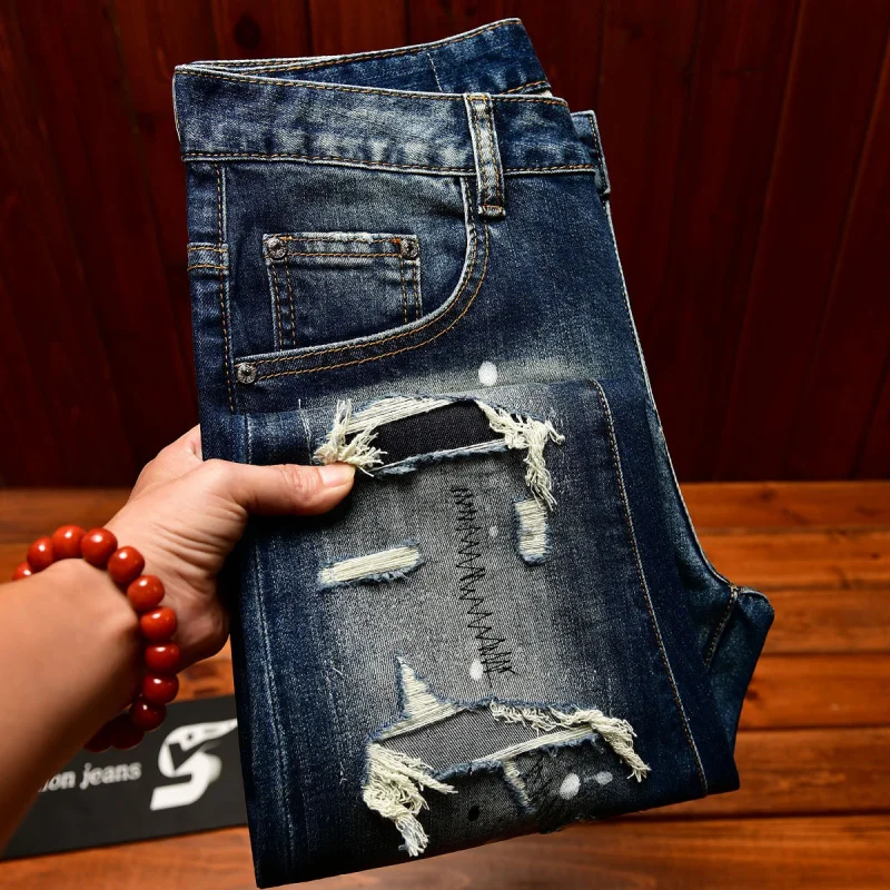 High end nostalgic jeans for men, slim fit with small holes, patches scraped, inkjet street trend, elastic retro denim pants view 6