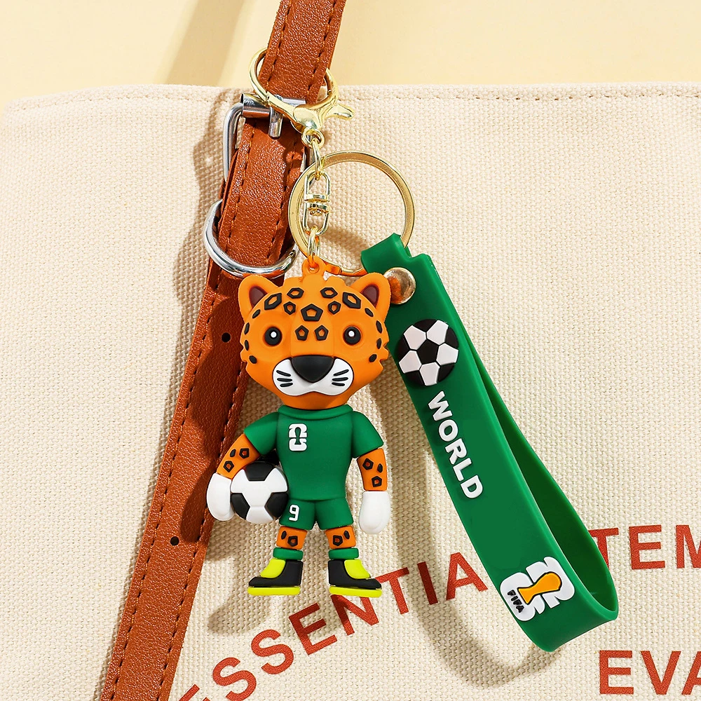 2026 Nuovo calcio IP mascotte squadra di calcio figura in PVC borsa fascino partita di calcio portachiavi souvenir per bambini e fan di Natale