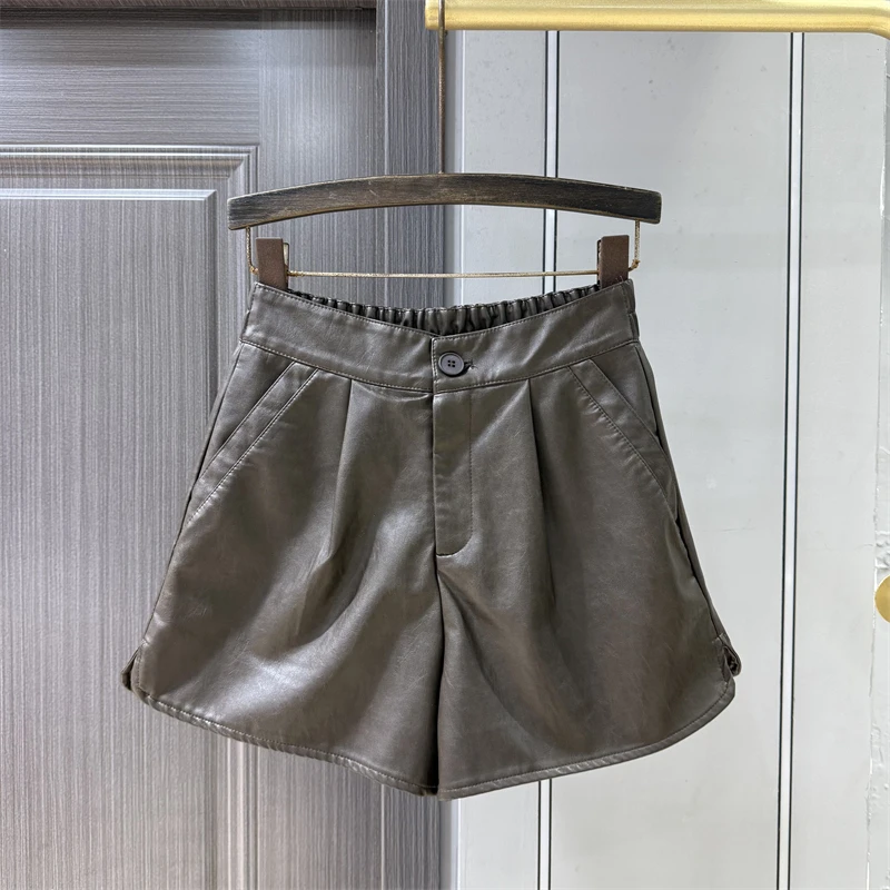 2025 autunno nuovo stile design senso nicchia pantaloncini in pelle PU pantaloncini a trapezio a gamba larga versatili a vita alta da donna