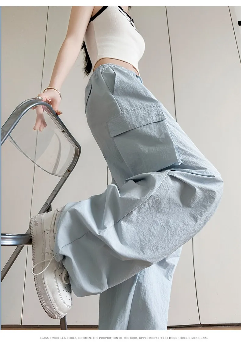 

Широкие брюки, синие женские летние сращенные эластичные уличные трендовые допаминовые музыкальные фестивальные брюки с завязками, модальные пояса, разделенные струящиеся 2025