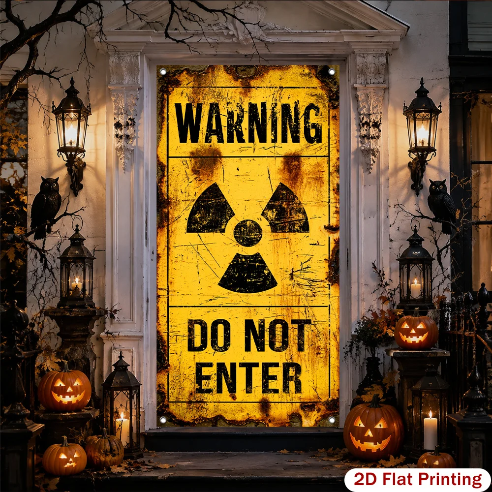 A yellow radiation warning sign printed banner for a Halloween-themed scene setup, with ghostly garden decorations