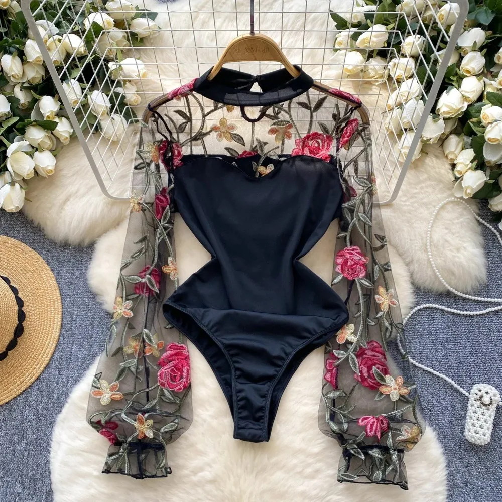 Kobiety seksowne siateczkowe body szykowne haftowane łączone kombinezony z długim rękawem podstawowe letnie wakacje na plaży wąskie pajacyki Ins odzież