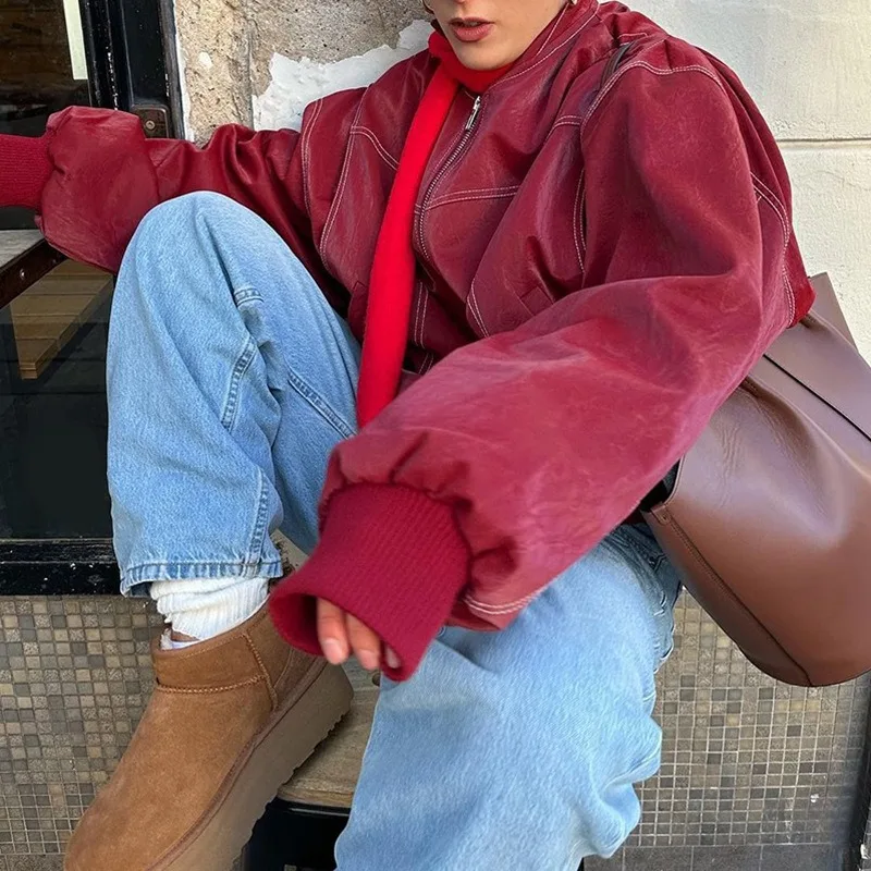 เสื้อแจ็คเก็ตผู้หญิงสำหรับฤดูใบไม้ผลิและฤดูใบไม้ร่วง หนังเทียม สไตล์สตรีทแวร์ ดีไซน์เฉพาะตัว ตัดต่อสีสัน แต่งปกเสื้อแบบปกเชิ้ต ซิปหน้า สไตล์มินิมอล