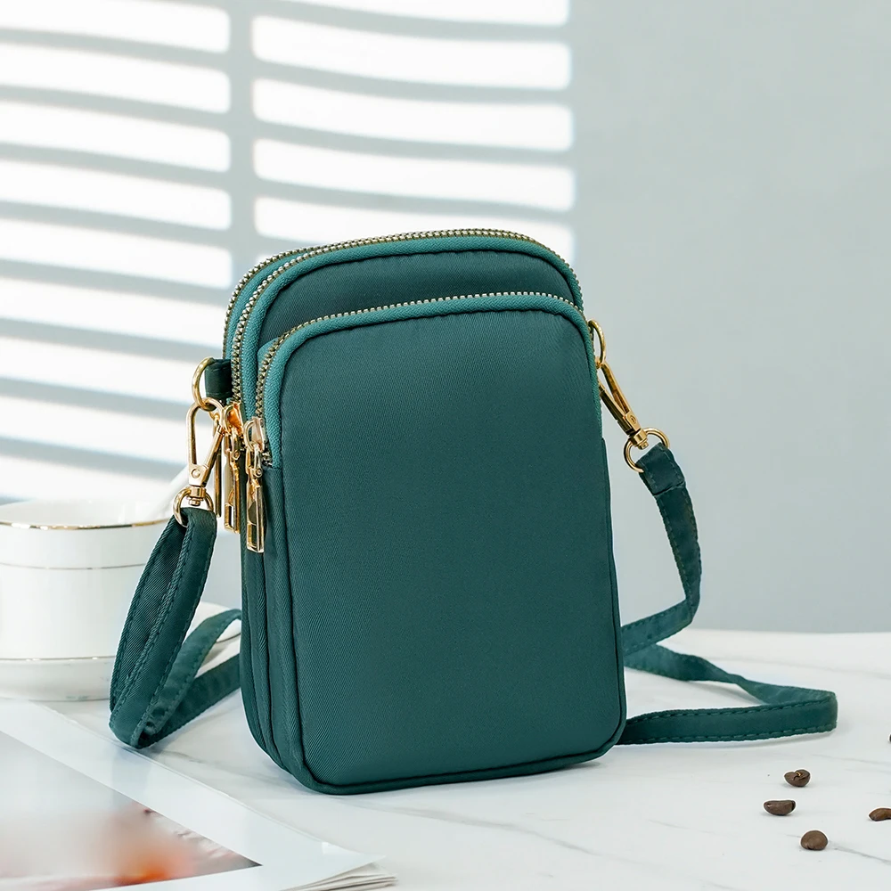 

New trendy and fashionable multi-purpose nylon lightweight crossbody bag for carrying cash and mobile phone.