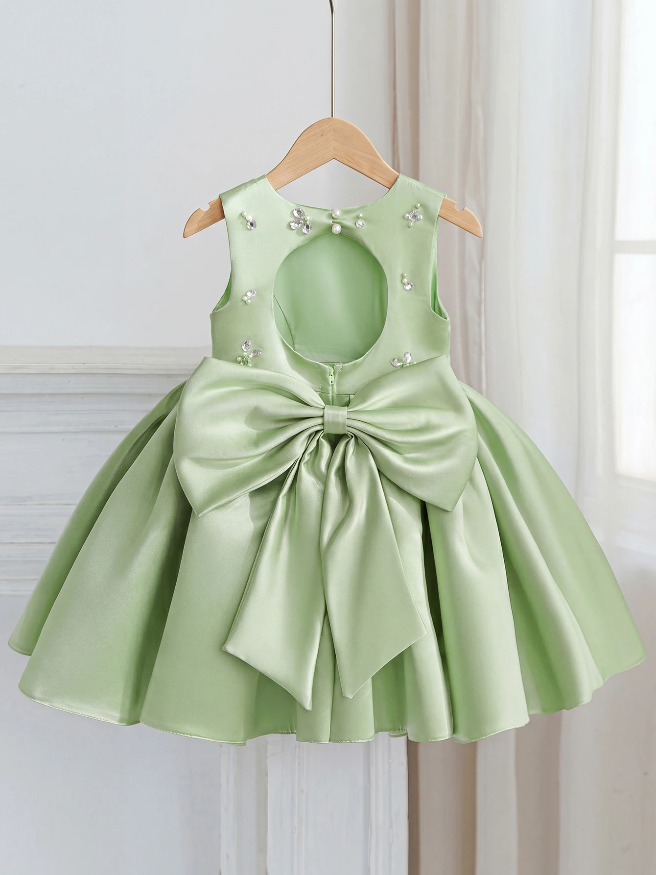 Girls Sage Green Satin Look Flower Girl Dress Pearl Beaded Open Back Oversized Bow A Line Gown For A Wedding Birthday Party Prom