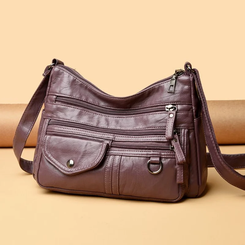 

Стильная кожаная сумка через плечо для женщин, регулируемый и элегантный дизайн от известного дизайнера для ежедневных поездок на работу