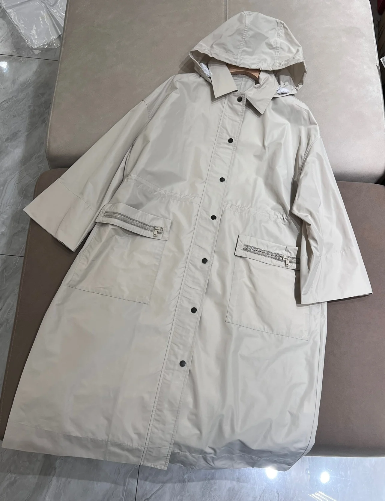 Exquisitely trimmed hooded spring casual trench coat