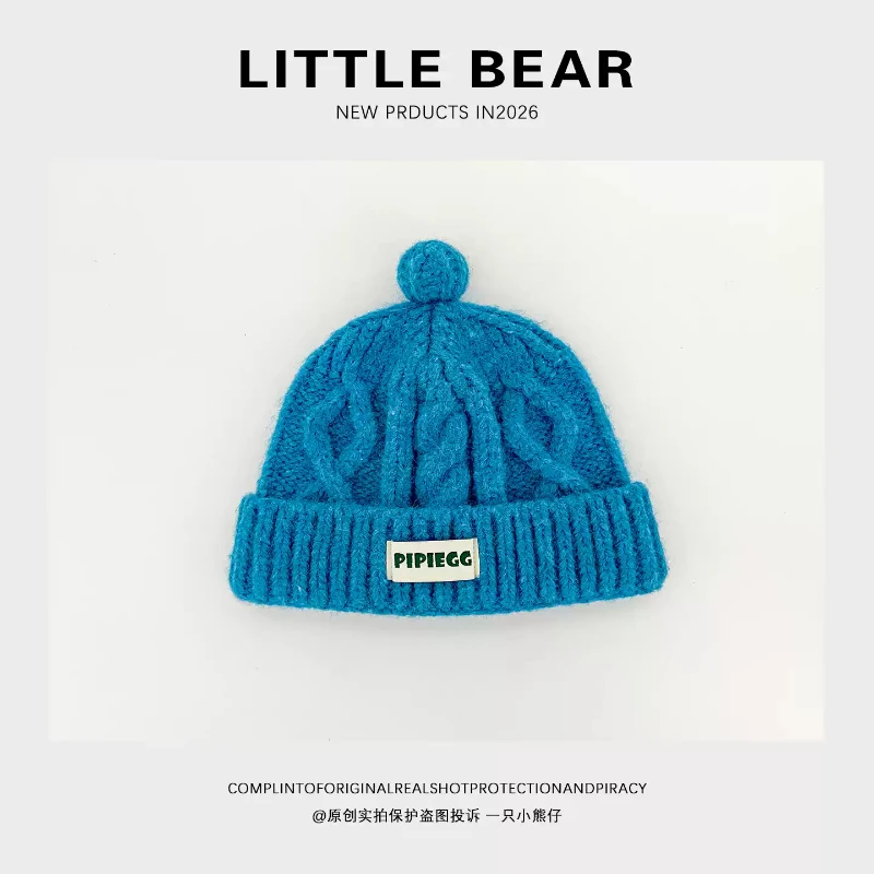 Y2K Solid Blue Cable Knit Beanies for Women Mini Pom Pom and Label Design Soft Fuzzy Stretchy Adult Streetwear Winter Hats