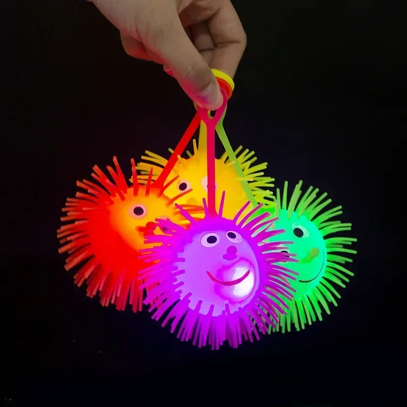 

1PC Luminous Hedgehog Ball Toy LED Flashing Rubber Bouncing Ball Toys for Children Kids Fingertip Elastic Glowing Hair Ball Gift