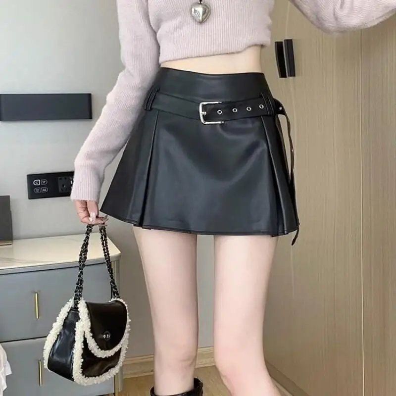 Amerikaanse stijl korte rok in Franse stijl, zilveren rok, lente- en zomerstudenten kunnen modetrend dragen tijdens het winkelen buiten