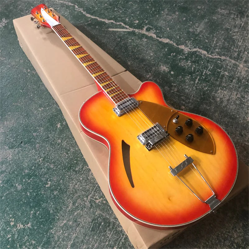 

Stock hollow body 6-string electric guitar, gold pickup, tail piece bridge, cherry burst guitar, free shipping