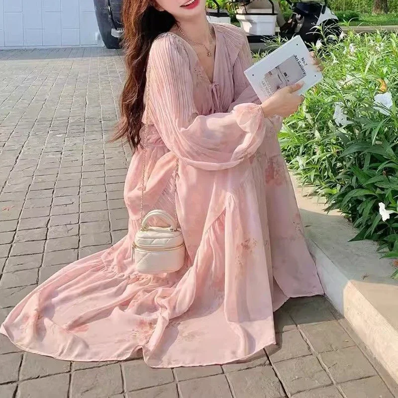 Kobiety Koreańska moda Sznurowane sukienki z kwiatowym nadrukiem Słodkie eleganckie sukienki z wysokim stanem V Szyja z długim rękawem Luźna sukienka plażowa Maxi Vestidos