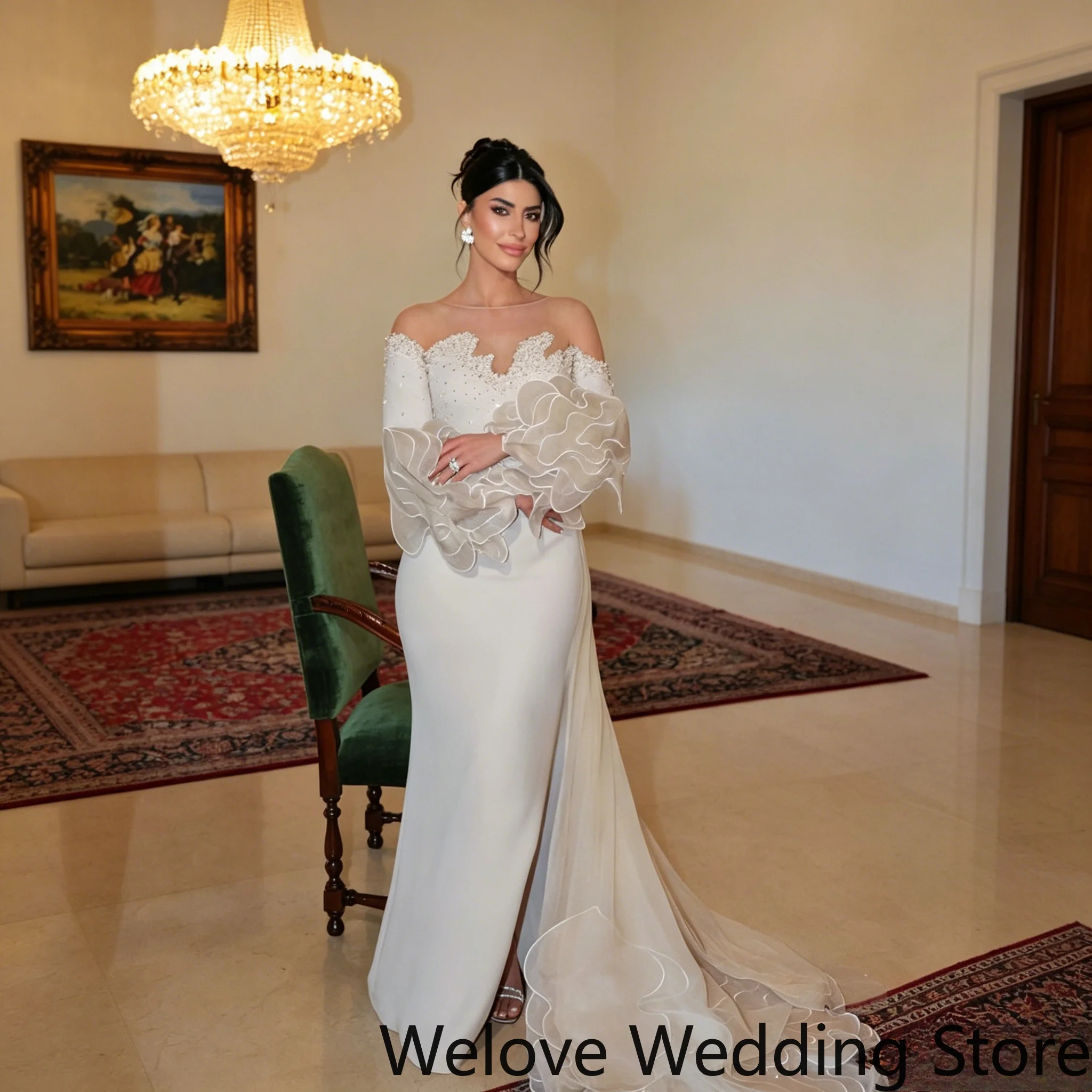 Mermaid Bridal Gown Featuring an Off-the-Shoulder Illusion Neckline Lace Embellished Bust Voluminous 3D Floral Long Sleeves