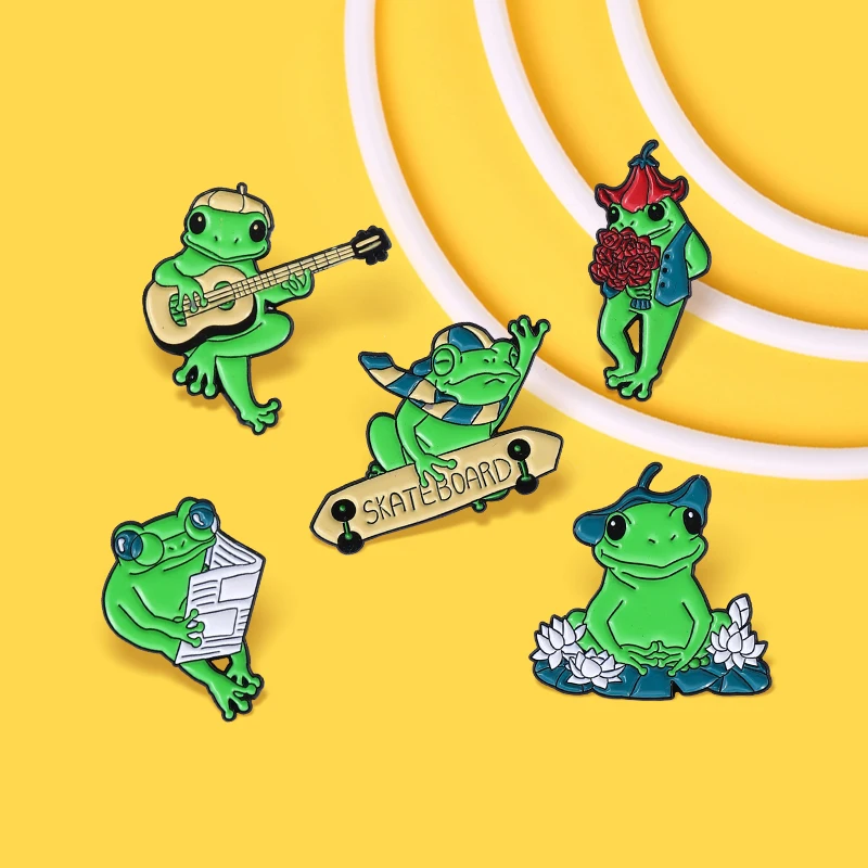 

Funny Frog Family Enamel Pin Green Frog Playing Guitar and Skateboarding Singing Brooches Badges Lapel Pin Jewelry Accessories