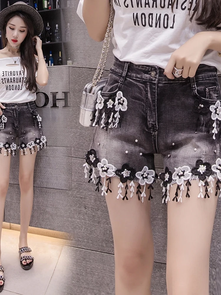 

Summer high waisted shorts female heavy workers nail bead embroidery flower black denim pants tassel lace trendy pants