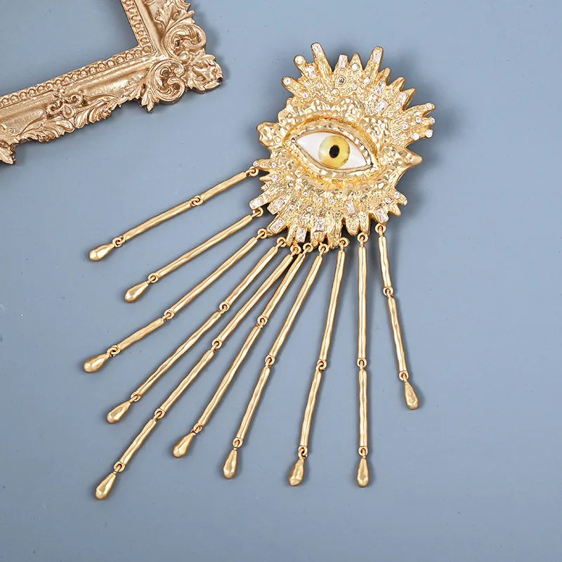 

Schiapare style Devil's Eye tassel brooch, vintage luxury art