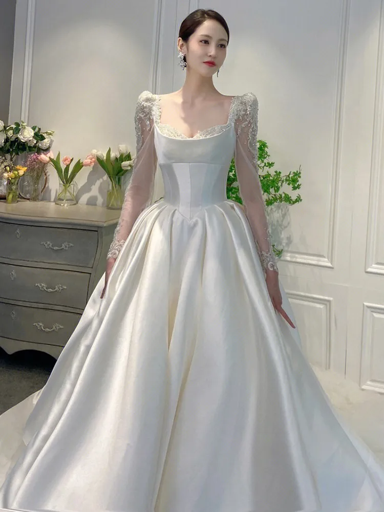

A new satin main fabric long-sleeved and large-sized dress with textured