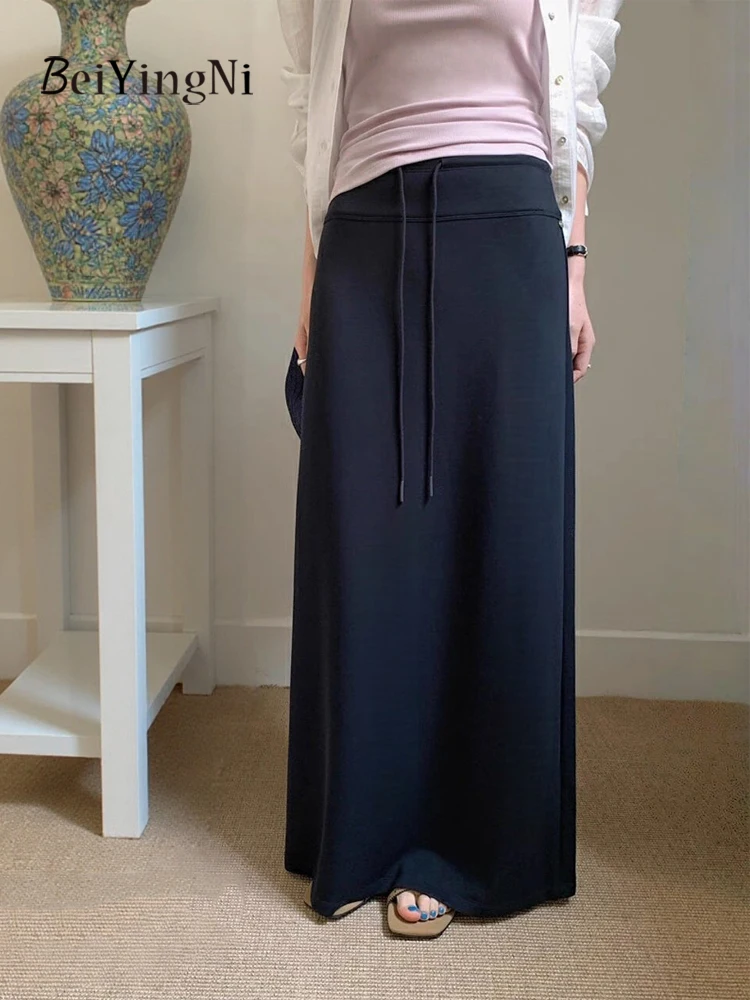 Beiyingni 2025 تنورة نسائية عصرية جديدة عادية سليم مرونة الخصر مستقيم سبليت ميدي التنانير الإناث عادية الكورية Faldas
