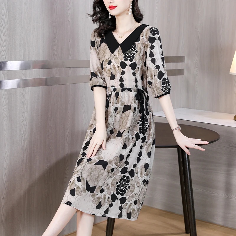 

2023 Summer Silk Flower Print Short Sleeve Doll Neck Dress Loose Large Waist Slim Mid length Dress Women's Knee Length Robe