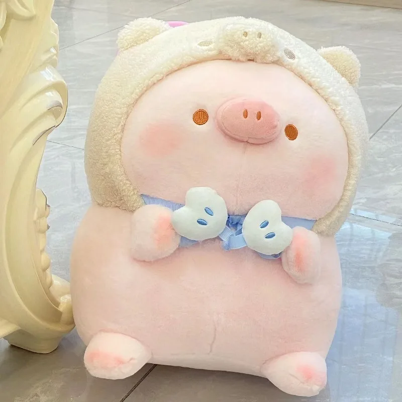 Une peluche cochon douce et paresseuse, ce ami câlin porte que des beaux rêves et des câlins confortables comme cadeau d'anniversaire