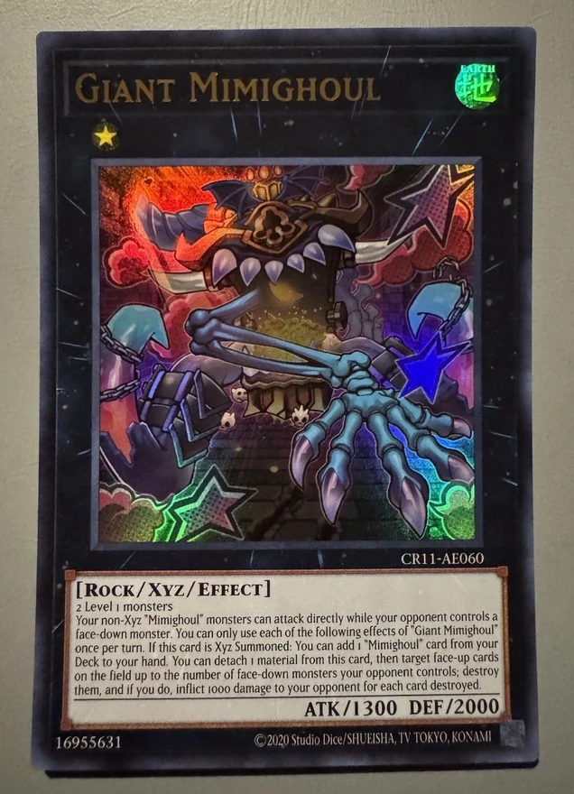 

Yugioh KONAMI Duel Monsters CR11-AE060 Giant Mimighoul Ultra Rare Asian English Collection Mint Card