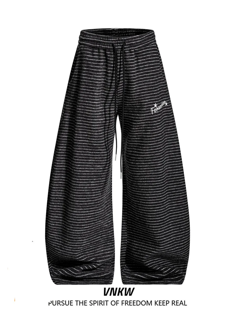 

Свободные удобные повседневные брюки для мужчин и женщин с эластичным поясом, широкими штанинами и зауженным низом, подходят для осени и зимы.