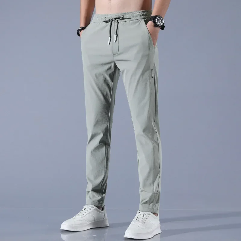 Men Fast Dry Stretch Pants Ice Silk Trousers Solid Color Mid-Waist Loose Breathable Straight-Leg Casu Men Clothing