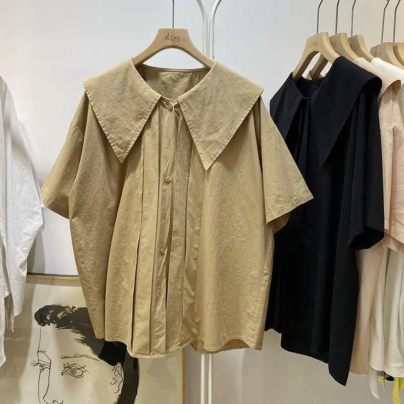 

Новая женская летняя блузка с коротким рукавом и пуговицами, свободного кроя, однотонная, больших размеров, в уличном повседневном стиле, модная, винтажная