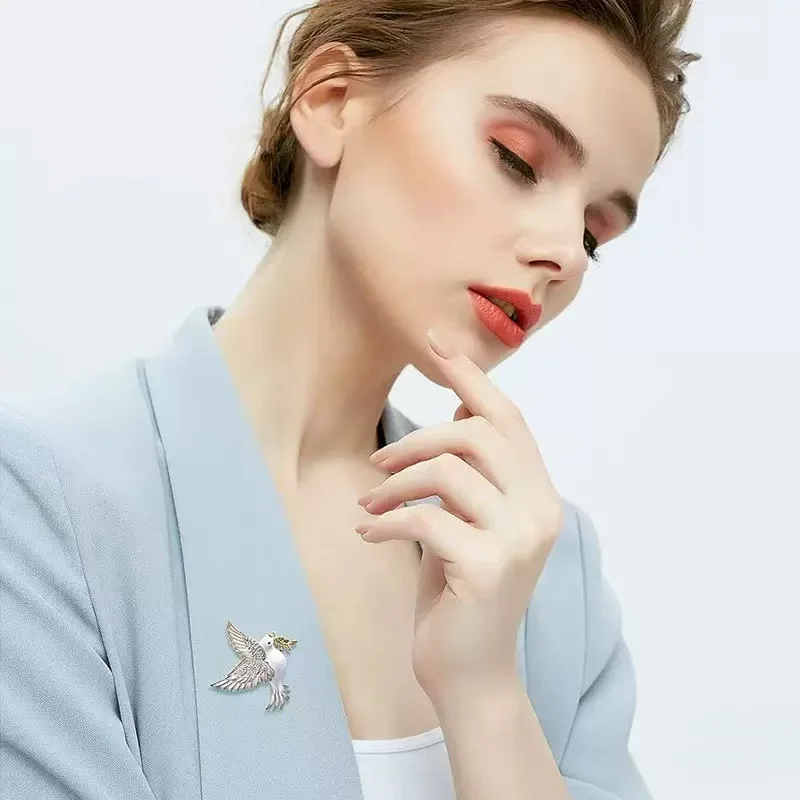 Wholesale of Alloy Enamel Peace Dove Brooch with Dripping Oil Crystal Chest Flower Pin view 5