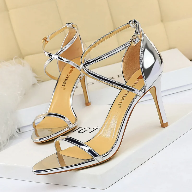 

European and American Style Fashion Sexy Nightclub Open Toe Metal Cross Strap Stiletto Heel Sandals Women's High Heels