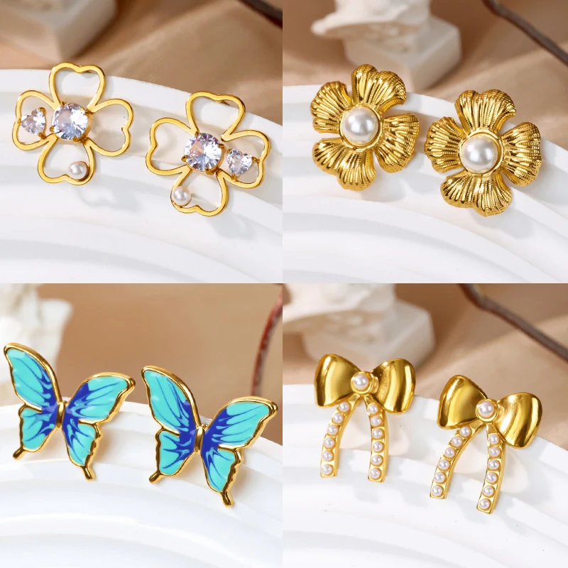 أقراط على شكل فراشة لطيفة للنساء من الفولاذ المقاوم للصدأ بأربعة أقراط على شكل زهرة البرسيم مجوهرات عصرية لحفلات الزفاف مقاومة للماء