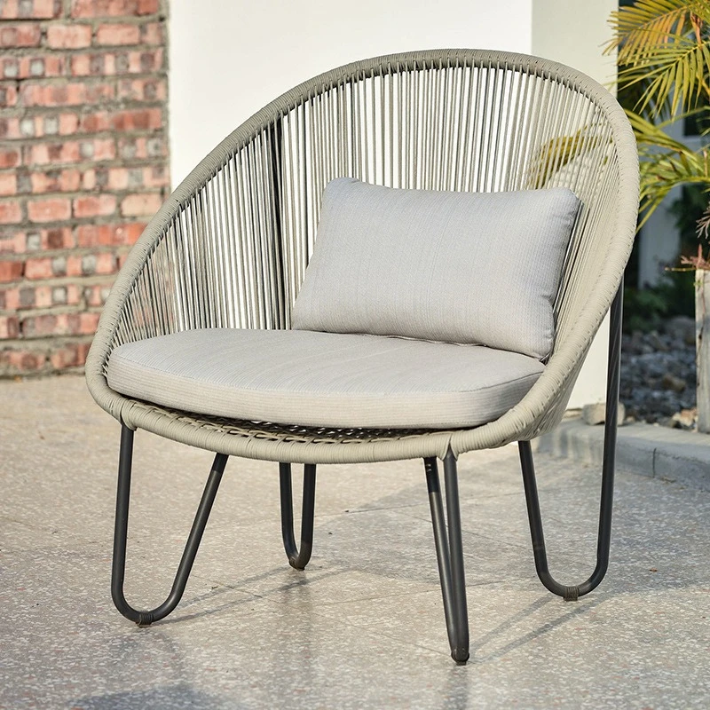 Rattan chair three-piece balcony table and chair simple designer outdoor furniture hotel courtyard open-air leisure chair