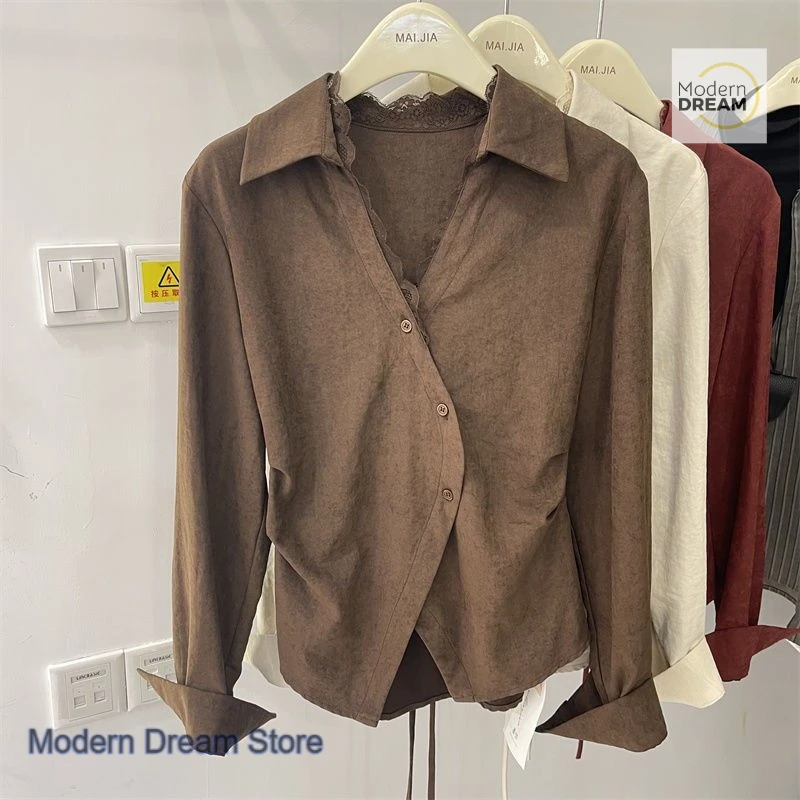 Camicia di nicchia senso design in stile francese da donna primavera e autunno nuova moda top a maniche lunghe sottile con cintura irregolare