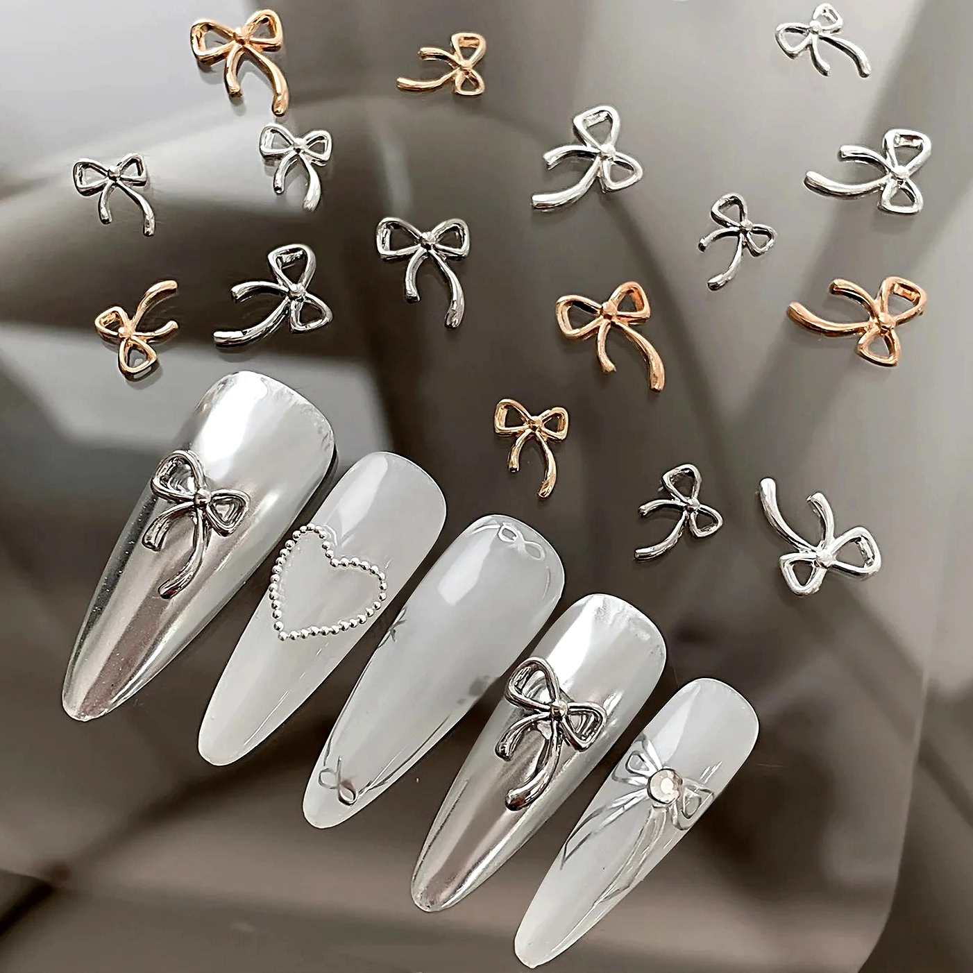 

Minimalist Alloy Bow Tie Metal Bowknot Gold Silver Butterfly Ribbon Nail Art Decorations Manicure Accessories Jewelry Wholesale