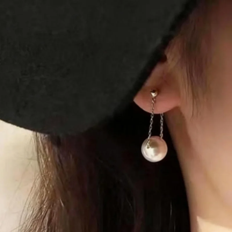 

Изысканные глянцевые серьги из натурального белого жемчуга Южных морей класса АААА, круглые, 8-9 мм, серебро 925 пробы