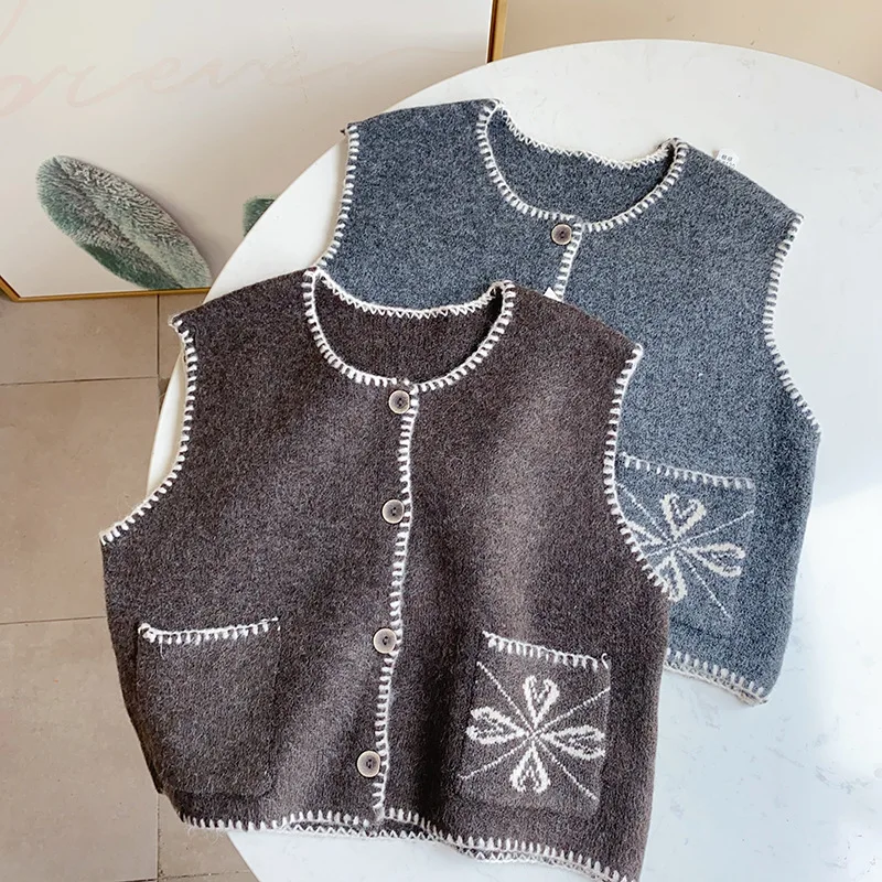 

Autumn and winter new kids knitted vest for girls retro hemming line round neck knitted cardigan